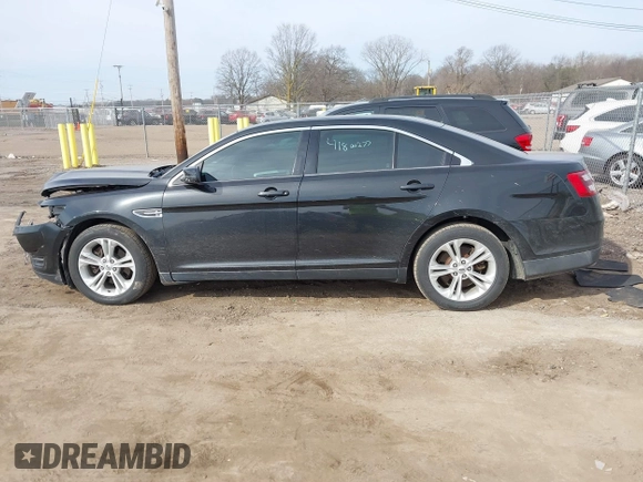2013 Ford Taurus SEL with VIN 1FAHP2E84DG188503, listed as a IAAI auction lot 41800277 with 215,015 mi miles. Bid and sale history available at carsss.com. Image 14.