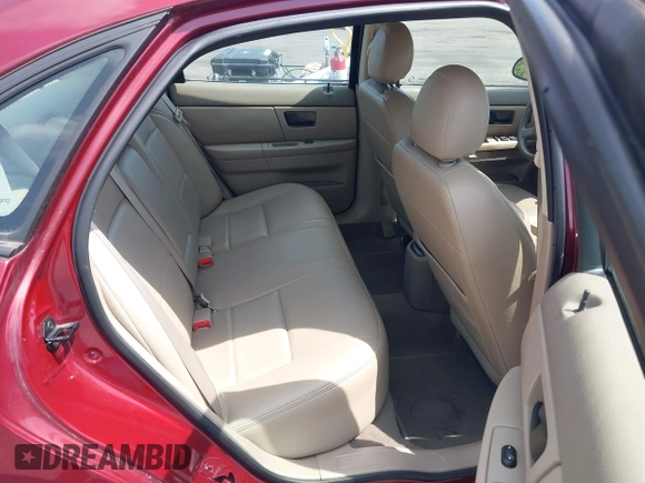 2004 Ford Taurus SES with VIN 1FAFP55S84A141126, listed as a IAAI auction lot 42200307 with 122,195 mi miles and . Bid and sale history available at DreamBid. Image 8.