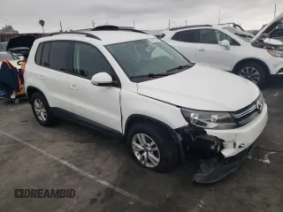 2015 Volkswagen Tiguan R-Line with VIN WVGAV7AX1FW610467, listed as a Copart auction lot 55670825 with 113,870 mi miles and Salvage Title. Bid and sale history available at DreamBid. Image 4.