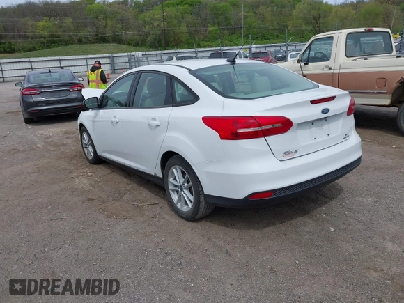 2016 Ford Focus SE with VIN 1FADP3F21GL403121, listed as a IAAI auction lot 42130743 with 103,592 mi miles and . Bid and sale history available at DreamBid. Image 3.