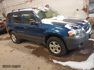 2007 Ford Escape XLT with VIN 1FMYU931X7KB35707, listed as a IAAI auction lot 41488192 with 144,285 mi miles. Bid and sale history available at carsss.com. Image 1.