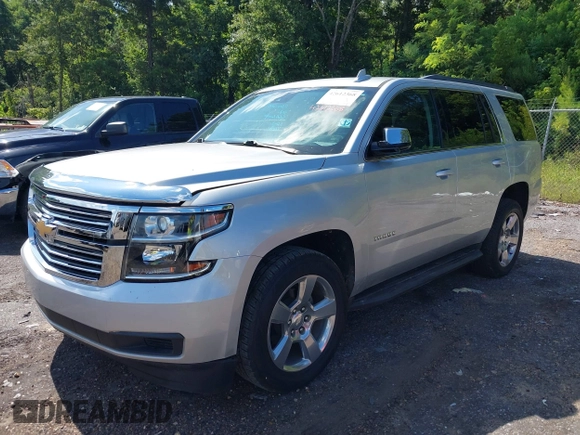 2017 Chevrolet Tahoe LT with VIN 1GNSCBKC6HR400761, listed as a IAAI auction lot 42612368 with 125,843 mi miles and . Bid and sale history available at DreamBid. Image 16.