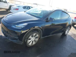 2023 Tesla Model Y Long Range with VIN 7SAYGDEE8PA151965, listed as a IAAI auction lot 41343497 with 25,869 mi miles. Bid and sale history available at carsss.com. Image 22.