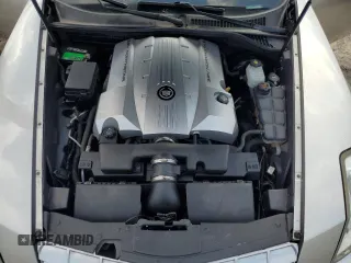 2004 Cadillac XLR z VIN 1G6YV34A545602056, wystawiony jako Copart lot #66506514 z przebiegiem Nie podano mil oraz Nie do naprawy. Historia ofert i sprzedaży dostępna na DreamBid. Obrazek 11.