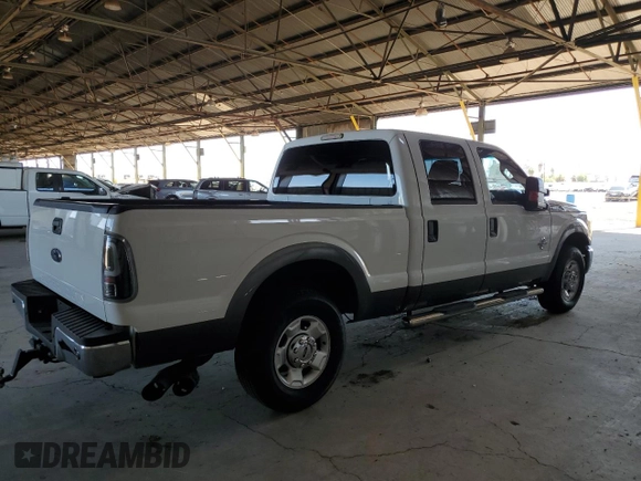 2011 Ford F-250 XL with VIN 1FT7W2AT2BEC57538, listed as a Copart auction lot 64505735 with 153,584 mi miles and Salvage title. Bid and sale history available at DreamBid. Image 3.