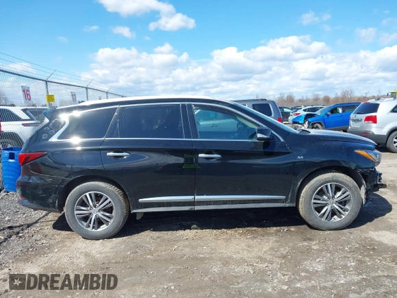 2020 Infiniti QX60 LUXE with VIN 5N1DL0MM9LC502865, listed as a IAAI auction lot 42000744 with 100,359 mi miles. Bid and sale history available at carsss.com. Image 14.