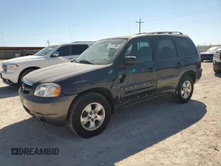 2003 Mazda Tribute LX with VIN 4F2YZ04123KM23151, listed as a Copart auction lot 74117164 with 112,790 mi miles and Salvage Title. Bid and sale history available at DreamBid. Image 1.