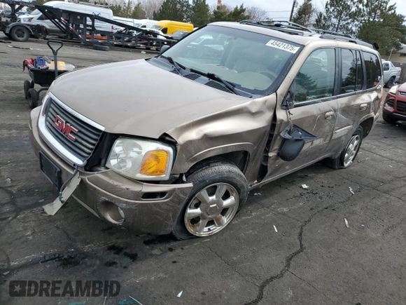 2002 GMC Envoy SLT with VIN 1GKDT13SX22353269, listed as a Copart auction lot 45421375 with 212,027 mi miles and Salvage Title. Bid and sale history available at carsss.com. Image 1.
