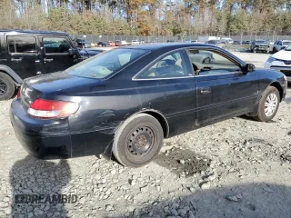1999 Toyota Solara SE with VIN 2T1CG22P1XC195671, listed as a Copart auction lot 80575724 with 185,634 mi miles and Salvage Title. Bid and sale history available at DreamBid. Image 3.