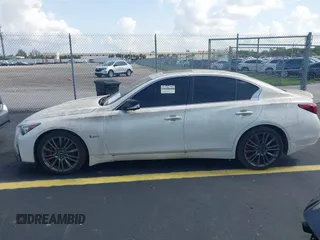 2019 Infiniti Q50 Red Sport 400 с VIN JN1FV7AP4KM760365, выставлен на аукционе IAAI как лот 42437474 с пробегом 90 225 миль миль и . История ставок и продаж доступна на DreamBid. Изображение 14.