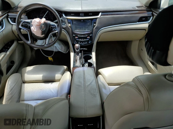 2013 Cadillac XTS Luxury with VIN 2G61P5S33D9125769, listed as a Copart auction lot 59671015 with 143,583 mi miles and Salvage title. Bid and sale history available at DreamBid. Image 8.