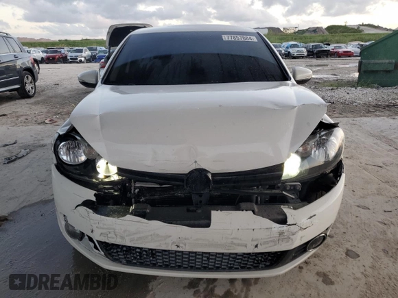 2013 Volkswagen Golf z VIN WVWDA7AJ2DW120061, wystawiony jako Copart lot #77857884 z przebiegiem 165 552 mil mil oraz Szkoda całkowita • Salvage title. Historia ofert i sprzedaży dostępna na DreamBid. Obrazek 5.