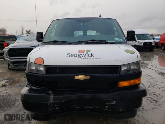 2019 Chevrolet Express Cargo с VIN 1GCWGAFPXK1143678, выставлен на аукционе Copart как лот 88565115 с пробегом 89 352 миль миль и Списание • Salvage title. История ставок и продаж доступна на DreamBid. Изображение 5.