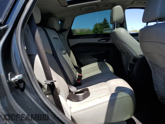 2014 Cadillac SRX Performance Collection z VIN 3GYFNCE36ES687267, wystawiony jako Copart lot #58242255 z przebiegiem 167 577 mil mil oraz Szkoda całkowita • Salvage title. Historia ofert i sprzedaży dostępna na DreamBid. Obrazek 11.