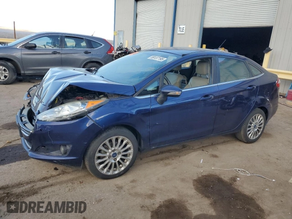 2016 Ford Fiesta Titanium z VIN 3FADP4CJ5GM175110, wystawiony jako Copart lot #89137195 z przebiegiem 129 193 mil mil oraz Szkoda całkowita • Salvage title. Historia ofert i sprzedaży dostępna na DreamBid. Obrazek 1.