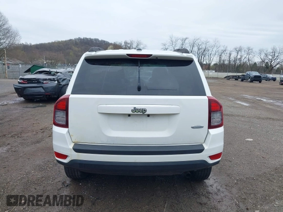 2014 Jeep Compass Latitude with VIN 1C4NJCEB8ED518193, listed as a IAAI auction lot 41957771 with 175,549 mi miles. Bid and sale history available at carsss.com. Image 17.