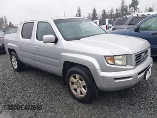 2006 Honda Ridgeline RTL with VIN 2HJYK16506H567153, listed as a IAAI auction lot 41658232 with 1 mi miles. Bid and sale history available at carsss.com. Image 1.
