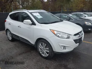 2013 Hyundai Tucson GLS with VIN KM8JU3AC4DU675511, listed as a IAAI auction lot 40765852 with 147,061 mi miles. Bid and sale history available at carsss.com. Image 1.