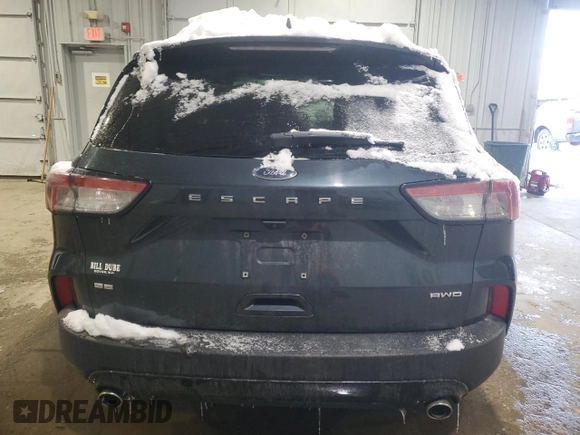2022 Ford Escape SE z VIN 1FMCU9G68NUB61479, wystawiony jako Copart lot #44100645 z przebiegiem Nie podano mil oraz Szkoda całkowita • Salvage title. Historia ofert i sprzedaży dostępna na DreamBid. Obrazek 6.