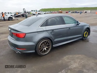2015 Audi S3 2.0T Prestige with VIN WAUFFGFF3F1062733, listed as a IAAI auction lot 41725140 with 106,815 mi miles. Bid and sale history available at carsss.com. Image 4.