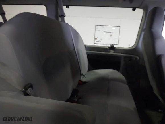 2012 Ford Econoline Wagon XL with VIN 1FBNE3BLXCDB00141, listed as a IAAI auction lot 41623087 with 173,289 mi miles. Bid and sale history available at carsss.com. Image 8.