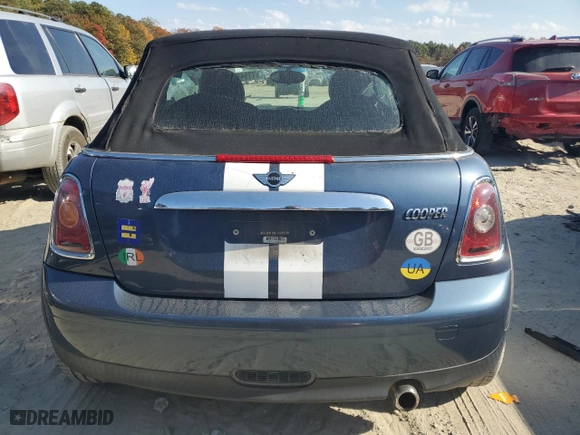 2009 MINI Cooper Convertible with VIN WMWMR33559TU96728, listed as a Copart auction lot 77949004 with 86,084 mi miles and Clean Title. Bid and sale history available at carsss.com. Image 6.