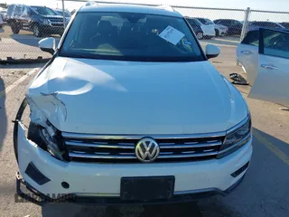 2018 Volkswagen Tiguan SEL Premium with VIN 3VV5B7AX2JM202908, listed as a IAAI auction lot 41137619 with 84,323 mi miles and . Bid and sale history available at DreamBid. Image 12.