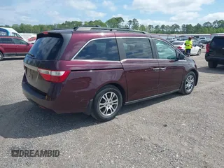 2012 Honda Odyssey EX with VIN 5FNRL5H45CB054113, listed as a IAAI auction lot 41760280 with 125,640 mi miles and . Bid and sale history available at carsss.com. Image 4.