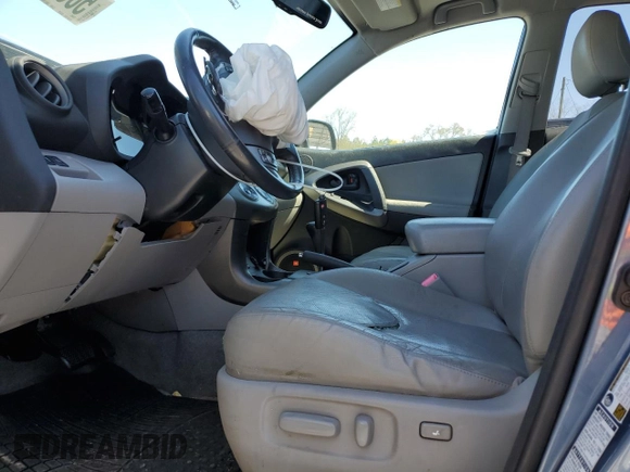 2010 Toyota RAV4 Limited with VIN JTMDF4DV6AD030594, listed as a Copart auction lot 50632655 with 173,327 mi miles and Salvage title. Bid and sale history available at DreamBid. Image 7.