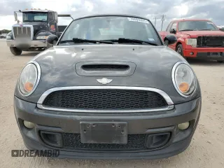 2014 MINI Coupe S z VIN WMWSX3C59ET409209, wystawiony jako Copart lot #78886564 z przebiegiem 118 632 mil mil oraz Tytuł czysty. Historia ofert i sprzedaży dostępna na DreamBid. Obrazek 5.