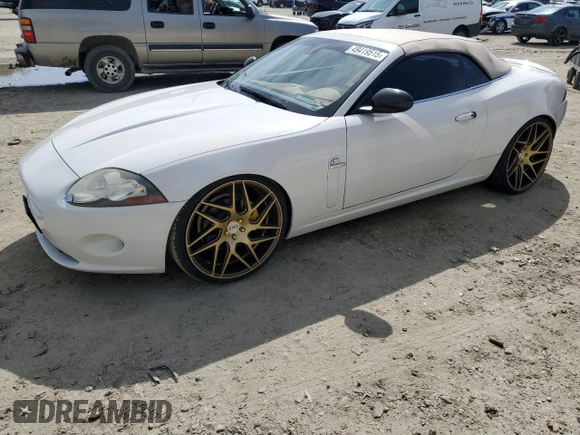 2007 Jaguar XK with VIN SAJDA44B775B05606, listed as a Copart auction lot 49419515 with 115,607 mi miles and Salvage Title. Bid and sale history available at DreamBid. Image 1.