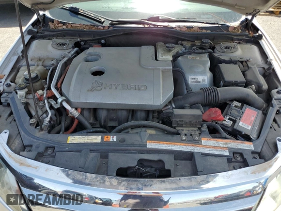 2010 Ford Fusion Hybrid z VIN 3FADP0L39AR273836, wystawiony jako Copart lot #54815095 z przebiegiem 245 960 mil mil oraz Czysty tytuł • Clean title. Historia ofert i sprzedaży dostępna na DreamBid. Obrazek 11.