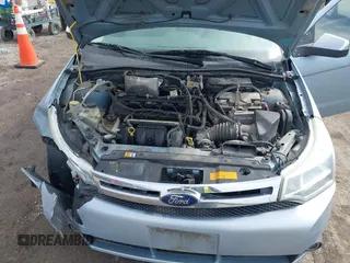 2009 Ford Focus SEL with VIN 1FAHP37N59W164619, listed as a IAAI auction lot 41762640 with 147,643 mi miles. Bid and sale history available at carsss.com. Image 10.