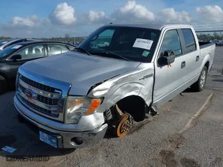 2013 Ford F-150 XL with VIN 1FTFW1CT9DKD02756, listed as a IAAI auction lot 40759592 with 218,975 mi miles. Bid and sale history available at carsss.com. Image 17.