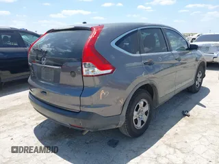2013 Honda CR-V LX with VIN 3CZRM3H37DG708916, listed as a IAAI auction lot 42450090 with 118,002 mi miles and . Bid and sale history available at DreamBid. Image 4.