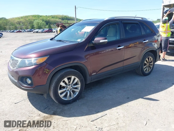 2012 Kia Sorento LX with VIN 5XYKTCA64CG279195, listed as a IAAI auction lot 42144679 with 116,690 mi miles. Bid and sale history available at carsss.com. Image 2.