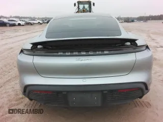 2021 Porsche Taycan z VIN WP0AA2Y14MSA18735, wystawiony jako Copart lot #72616054 z przebiegiem Nie podano mil oraz Szkoda całkowita • Salvage title. Historia ofert i sprzedaży dostępna na DreamBid. Obrazek 6.