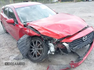 2018 Mazda 3 Touring with VIN 3MZBN1V3XJM183616, listed as a IAAI auction lot 42038219 with 130,268 mi miles and . Bid and sale history available at DreamBid. Image 6.