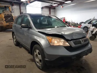 2009 Honda CR-V LX with VIN JHLRE48359C018488, listed as a IAAI auction lot 41824887 with 203,235 mi miles. Bid and sale history available at carsss.com. Image 1.