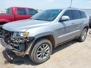 2014 Jeep Grand Cherokee Limited with VIN 1C4RJFBG4EC589321, listed as a IAAI auction lot 42335043 with 153,428 mi miles and . Bid and sale history available at DreamBid. Image 18.