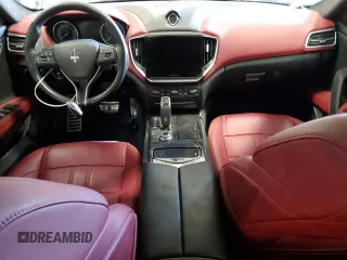 2023 Maserati Ghibli Modena z VIN ZAM57YSMXPX411516, wystawiony jako Copart lot #58330765 z przebiegiem Nie podano mil oraz Szkoda całkowita • Salvage title. Historia ofert i sprzedaży dostępna na DreamBid. Obrazek 8.