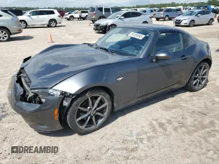 2020 Mazda MX-5 Miata Grand Touring z VIN JM1NDAM72L0414974, wystawiony jako Copart lot #54155545 z przebiegiem 53 231 mil mil oraz Szkoda całkowita • Salvage title. Historia ofert i sprzedaży dostępna na DreamBid. Obrazek 1.