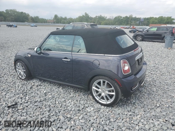2012 MINI Convertible S with VIN WMWZP3C56CT250886, listed as a Copart auction lot 50027405 with 92,990 mi miles and Salvage title. Bid and sale history available at DreamBid. Image 2.