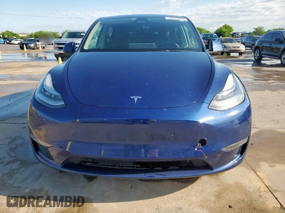 2022 Tesla Model Y Long Range z VIN 7SAYGDEEXNF372693, wystawiony jako Copart lot #53275555 z przebiegiem 51 165 mil mil oraz Szkody całkowita. Historia ofert i sprzedaży dostępna na DreamBid. Obrazek 5.