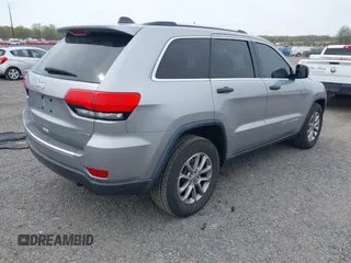 2015 Jeep Grand Cherokee Limited z VIN 1C4RJFBG6FC717026, wystawiony jako IAAI lot #42078788 z przebiegiem 106 755 mil mil oraz . Historia ofert i sprzedaży dostępna na DreamBid. Obrazek 4.
