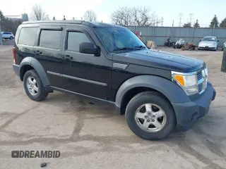 2007 Dodge Nitro SXT with VIN 1D8GU28KX7W529095, listed as a IAAI auction lot 41795390 with 124,069 mi miles. Bid and sale history available at carsss.com. Image 1.
