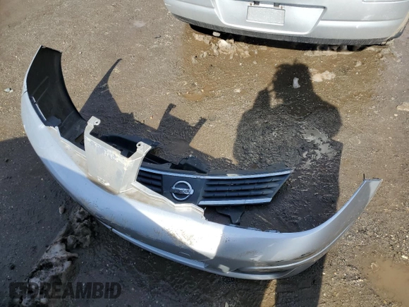 2007 Nissan Versa SL z VIN 3N1BC13E17L414305, wystawiony jako Copart lot #45171315 z przebiegiem 150 291 mil mil oraz Szkoda całkowita • Salvage title. Historia ofert i sprzedaży dostępna na DreamBid. Obrazek 12.