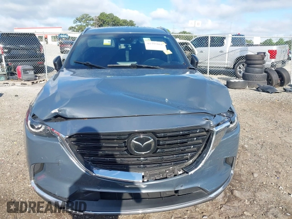 2021 Mazda CX-9 Grand Touring with VIN JM3TCADY7M0528223, listed as a IAAI auction lot 42395861 with 57,767 mi miles and . Bid and sale history available at DreamBid. Image 12.