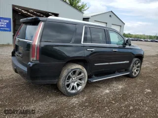 2015 Cadillac Escalade Premium with VIN 1GYS4NKJ5FR650621, listed as a Copart auction lot 66966264 with 141,517 mi miles and Salvage Title. Bid and sale history available at carsss.com. Image 3.