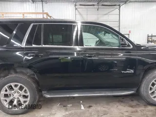 2016 GMC Yukon SLT with VIN 1GKS2BKC9GR176948, listed as a IAAI auction lot 41361221 with 125,178 mi miles. Bid and sale history available at carsss.com. Image 14.